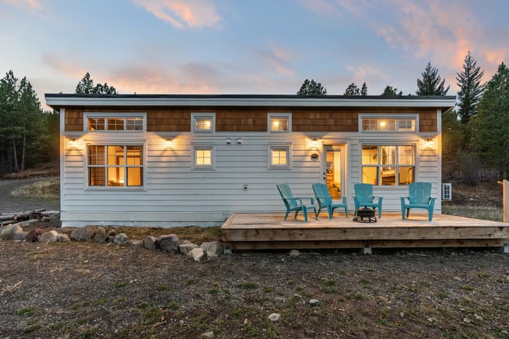 The Silvertip tiny house can be installed on a trailer or permanent foundations and offers a spacious apartment-like interior