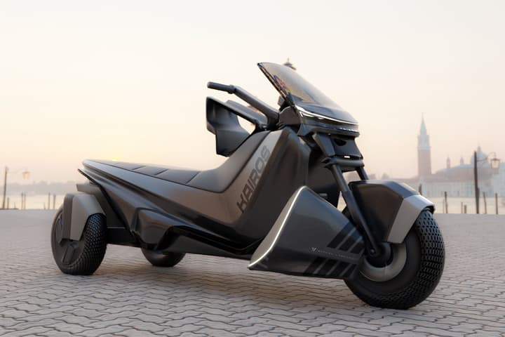 A rendering of the Kairos EV, showing one of its Mobile Lateral Elements (flared component by front wheel) along with its Programmed Restraint Device (triangular component behind handlebars)